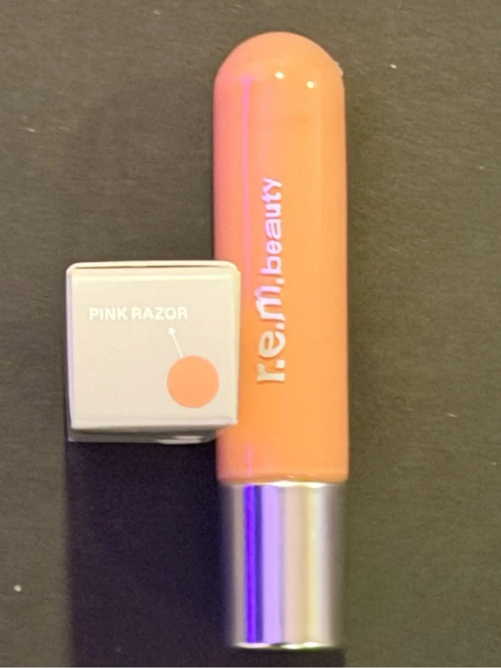 R.E.M. On Your Collar Plumping Lip Plumper Gloss — Pink Razor